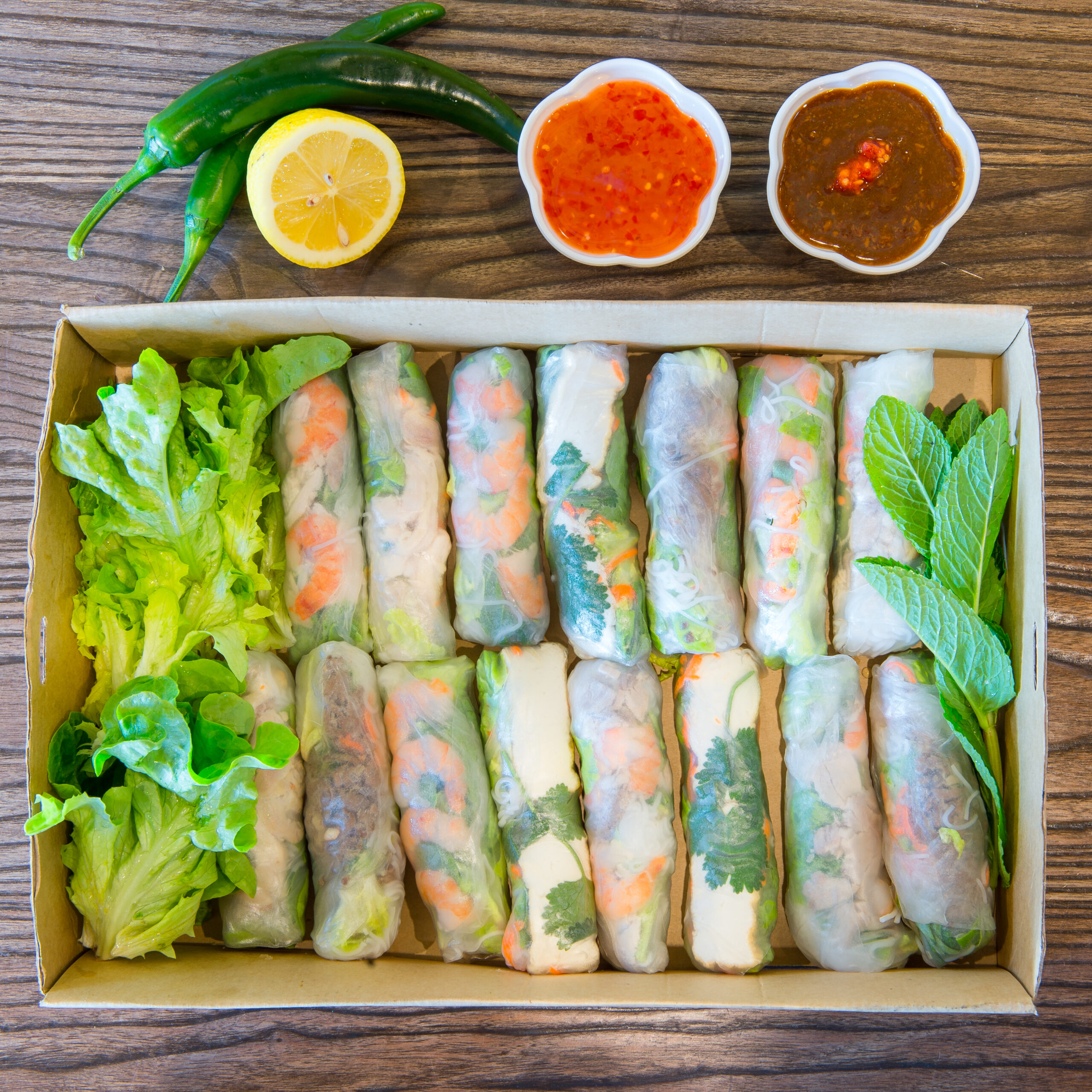 Mixed rice paper rolls ready for sharing